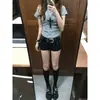 Shorts de mezclilla negros de tiro bajo para mujer, modernos y versátiles, estilo nuevo milenio, subcultura retro ligera, ajustados versátiles, hot pants