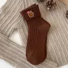 Medias navideñas para niños, otoño e invierno, lindas medias rojas de algodón para Año Nuevo, estilo japonés, lindas medias bordadas con dibujos animados de moda.