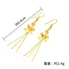 Aretes Chapados en Oro con un Diseño de Moda Único con Estrellas y Notas Musicales, un Accesorio Sencillo de Estilo Largo para Niñas, con Borlas Doradas para un Aspecto Elegante