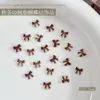 Accesorios de otoño e invierno para decoración de uñas con lazo color café, modernos y populares, con un diseño de pajarita estilo Maillard, decoraciones de uñas ponibles y pequeños adornos de resina