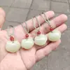 Venta al por mayor de fábrica jade afgano natural jade blanco azul candado ruyi colgante de jade estudio candado Xiangyun colgante de jade colgante