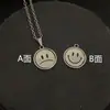 Suministro Directo de Fábrica collar con colgante de cara sonriente giratorio para hombre y mujer, cadena para suéter de mujer, joyería, suministro de primera mano