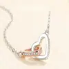 Colar Coração com Coração Europeu e Americano Transfronteiriço Cravejado de Diamantes para Mulheres, Design de Nicho, Anel Duplo, Pingente Bicolor Tendência, Joia de Corrente para Clavícula