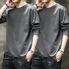 Temporada de primavera y otoño, camiseta lisa de manga larga popular, corte holgado, cuello redondo, camiseta interior para hombre, top simple y versátil