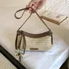 2026 Nuevo Bolso de Hombro Único Tejido de Paja Estilo Resort para Mujer Bolso Tejido Bolso Cruzado de Playa Estilo Coreano Versátil Diseño de Nicho Sentido