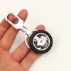 Accesorios de modificación de coche transfronterizos, pequeño regalo para hombre, amortiguador de metal, colgante de neumático, llavero de cubo de rueda al por mayor