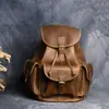 Mochila retro de piel de vaca de primera capa para hombre Bolso de piel de vaca Crazy Horse para portátil Casual Mochila de cuero para mujer Bolso de viaje Bolso para paraguas