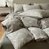 Conjunto de Quatro Peças Jacquard Tingido em Fio de Algodão Puro 2026