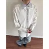 Camisa masculina listrada com retalhos, estilo duas peças falsas, de manga comprida, um design moderno e estiloso para primavera e outono, com corte relaxado e casual.