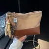 Bolsa Retro Fosca Transfronteiriça para Mulheres, Nova Bolsa Transversal Acolchoada com Corrente de Nicho Outono e Inverno 2026, Bolsa Saco Popular