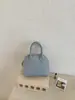 Mini Bolso de Concha para Mujer 2026 Nuevo Nicho de Gama Alta Bolso de Bolos de Moda Mini Bolso de Mano Bolso Bandolera para Mujer