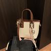 Bolsa de balde com textura casual 2025 primavera design de nicho tendência nova moda feminina simples bolsa de ombro transversal