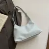 Moda Nova Primavera 2026 Nicho Tendência Nicho Alta Aparência Bolsa de Ombro Único Sob o Braço Bolsa Tote Textura Superfície Brilhante Feminina
