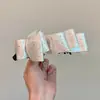 Pinza de plátano de moda y elegante para mujer, versátil para el uso diario, pinza para el pelo de lunares de alto valor, accesorio para el pelo de pinza de garra de lazo de estilo coreano simple