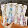 Cadena para Teléfono con Lentejuelas que Cambian de Color Sensible a la Luz Transfronteriza Llavero Colgante de Estrella de Cinco Puntas Accesorios para Bolsos Venta al por Mayor de Comercio Exterior