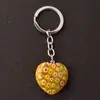 Llavero con colgante de corazón transfronterizo de 30*12 mm, corazón de cristal rosa de piedra natural, accesorio popular para DIY