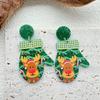 Pendientes acrílicos con forma de guantes de alce navideños creativos, pendientes de Papá Noel con dibujos animados, pendientes de diseño exagerado para mujer.