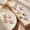 Aretes de acero de titanio con bola retorcida estilo coreano y mariposa micro pavimentada con circonita, multicolor, puño de oreja de nudo de mariposa, broquel para lóbulo