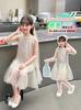 Vestido de Niña Verano 2025 Nuevo Infantil Elegante Delgada Moda Vestido Chaleco Princesa de Malla con Lentejuelas para Bebé