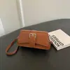 Otoño 2026 Nuevo Artículo Diseño de Nicho Bolso Pequeño Bolso de Hombro Cruzado Bolso de Mano Versátil de Gama Alta Venta al por Mayor Bolso para Mujer