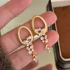Pendientes Redondos con Borla, Incrustaciones de Diamante y Aguja de Plata, Pendientes de Moda, Exquisitos, Versátiles, Lujo Ligero de Nicho, Pendientes de Gama Alta al por Mayor para Mujer