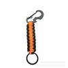 Directo del fabricante: Hebilla de escarabajo negro, colgante de mochila tejido con paracord, abridor de botellas multifuncional, llavero para exteriores