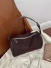 Bolsos transfronterizos bolsa cilíndrica tipo almohada, bolso cruzado para mujer, cuero mate retro, bolso versátil para el día a día, elegante bolso de axila con un toque de alta gama