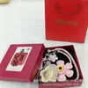 Colgante de teléfono móvil de oro, charm de bolsa de flor de dinero, llavero de oro puro 999, regalos promocionales culturales y creativos al por mayor