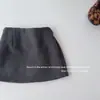Falda Larga de Mezcla de Lana Elegante para Niñas 2026 Otoño/Invierno Estilo Coreano Nueva Cintura Alta Línea A Anti-Exposición Contiene Lana Chica Picante Corta