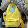 Mochila simple y fresca de color liso 2023 nueva mochila ligera para estudiantes bolso de mano casual de moda versátil para mujer