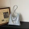 Bolsa Tote Feminina Nova Moda Primavera 2026 Textura Simples Bolsa de Ombro Design de Nicho Bolsa Casual Tendência