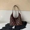 Bolso de mano para mujer transfronterizo colección otoño 2026: diseño único, estampado de lunares, bolso de hombro versátil, bolso tote y de axila retro a la moda
