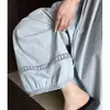 Calça de renda oca estilo coreano simples para mulheres, fina e modeladora, cintura elástica, calça casual cropped de perna larga versátil para o início do outono