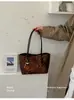 Bolsa Grande Estampa Leopardo Retrô Feminina 2026 Outono/Inverno Nova Bolsa de Ombro Única para o Dia a Dia Bolsa Tote Simples Bolsa Saco