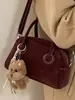 Bolsa de Bolos Portátil para Mujer 2025 Invierno Nueva Moda Retro Bolsa Almohada Viajero de Alto Valor Bolsa Individual