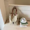 2026 nuevo bolso de lona de color liso, estilo coreano, nicho de moda, moderno, casual, simple, de alta calidad y elegante, bolso tote