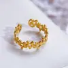 Comercio exterior transfronterizo europeo y americano anillo de corazón con líneas irregulares de acero inoxidable anillo abierto ajustable de nicho de alta gama joyería para manos