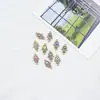 Al por mayor Estilo Coreano Doble Colgante Patrón Ojo del Diablo Aleación con Goteo de Aceite Collar Pulsera Joyería Accesorios DIY Colgante Pequeño