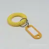 Atacado de fabricantes pulseira de mola plástica de linha telefônica marca de mão para sauna anel retrátil pulseira corda de mola armazenamento anel QQ