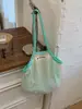 Bolsa de Palha Tecida de Luxo para Verão 2025 Nova Moda Vazada Versátil Grande Capacidade Ombro Bolsa de Axila