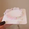 Pulsera de cristal rosa natural piedra hibisco pulsera de moda pulsera rosa pequeña y fresca en stock accesorios de principios de primavera al por mayor