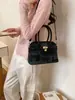 Bolso Súper Popular de Comercio Exterior con Forma de Concha Nuevo Modelo 2026 Versátil Bolso Cruzado de Cuadros Bolso de Hombro de Nicho de Alto Valor Estilo Americano