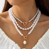 Collar Europeo y Americano de Moda Transfronteriza con Hebilla Ot, Perla de Imitación y Múltiples Capas, Collar de Cadena para Clavícula con Cuentas de Alta Gama estilo Lujo Ligero para Mujer