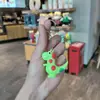 Chaveiro de Pelúcia Popular de Dinossauro com Bolinhas Desenho Animado Porta-Chaves de Carro Pingente Acessório de Caixa Surpresa Arqueológica Presente Promocional