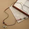 2026 Colar Retro de Corda Trançada com Contas de Aço Titânio para Mulheres Design de Nicho Estilo Étnico Corrente para Suéter Acessórios de Flor