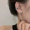 Clip para oreja de plata tailandesa de cinco garras sin perforación personalidad única estilo frío hip hop genial guapo retro calavera desgastada Palma hebilla de oreja
