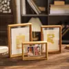 Marco de fotos de madera maciza soporte de escritorio sensación de alta gama a3 a4 caligrafía y pintura montaje impresión marco de exhibición nogal negro marco transparente de doble cara