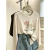 Camiseta de algodón de manga larga con estampado de copo de nieve para mujer, estilo casual de nicho, a la moda y ligera, con un toque de alta gama, top blanco adecuado para capas