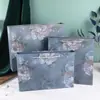 En stock Bolsa de Regalo Naranja Rectangular Bolso Grande Tienda de Ropa Bolsa de Papel para Compras Bolsa para Regalo de Cuidado de la Piel