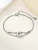 Nuevo Anillo de Acero Inoxidable al por Mayor Transfronterizo 26 Letras Inglesas Anillo de Doble Capa Pulsera Chapada en Oro